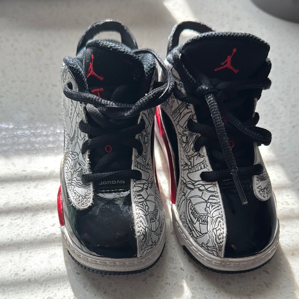 Jordan Black and Red Sneakers Retro Basketball Design